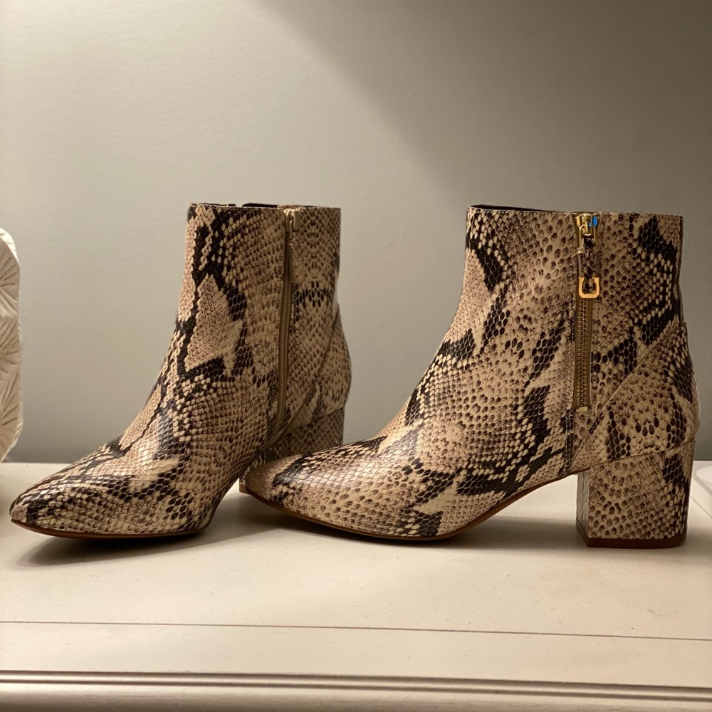 Size 9 Cole Haan sightly textured snake skin booties with gold accents.